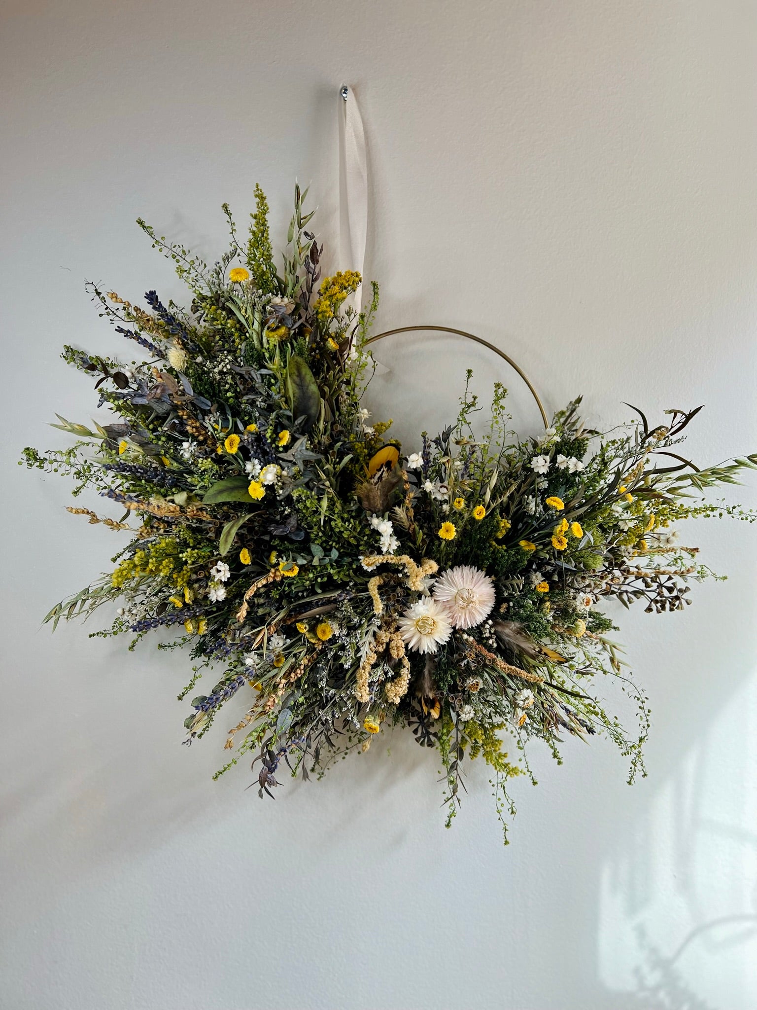 Medium 10" wreath. 16" with flowers